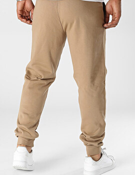 pantalón Puma basico hombre con puño, tostado